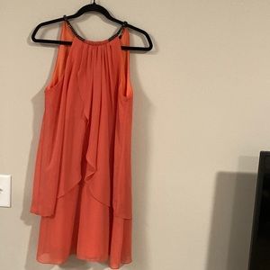 Brand new without tags size 10 tangerine colored dress! No defects!